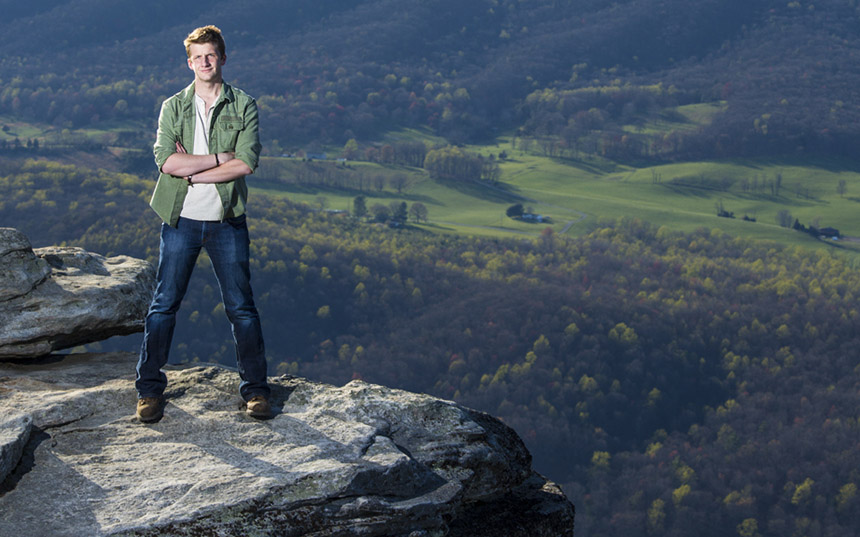 Photo of Mackay Pierce on a cliff